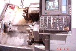 CNC TURNING CENTERS: WARNER & SWASEY TITAN 6167 CNC LATHE, 4-AXIS, LIVE TOOLING, FANUC  15TT, 29 SWING, CHIP, '90 (4146), Click to view larger photo...