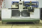 CNC VERTICAL MACHINING CENTERS: MIGHTY COMET VMC-1250 P/G 50 TAPER CNC VERTICAL MILL, 58 x 28.5 x 24.5, 4000 RPM,  20 ATC, GEARBOX, BOX WAY, FANUC, Click to view larger photo...