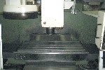 CNC VERTICAL MACHINING CENTERS: MIGHTY COMET VMC-1250 P/G 50 TAPER CNC VERTICAL MILL, 58 x 28.5 x 24.5, 4000 RPM,  20 ATC, GEARBOX, BOX WAY, FANUC, Click to view larger photo...