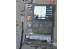 CNC VERTICAL MACHINING CENTERS: HAAS VF-2  CNC MILL, 30 x 16 x 20, 20HP 10000 RPM, SIDEMOUNT ATC, PROBE PACKAGE, A4TH AXIS PREWIRE, LOADED PAKG D, '06, Click to view larger photo...