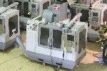 CNC VERTICAL MACHINING CENTERS: HAAS VF-2  CNC MILL, 30 x 16 x 20, 20HP 10000 RPM, SIDEMOUNT ATC, PROBE PACKAGE, 4TH AXIS PREWIRE, LOADED PAKG D, '06, Click to view larger photo...
